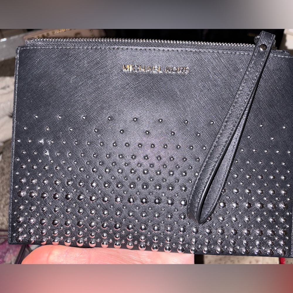 Michael kors black and silvered oversized going out clutch.